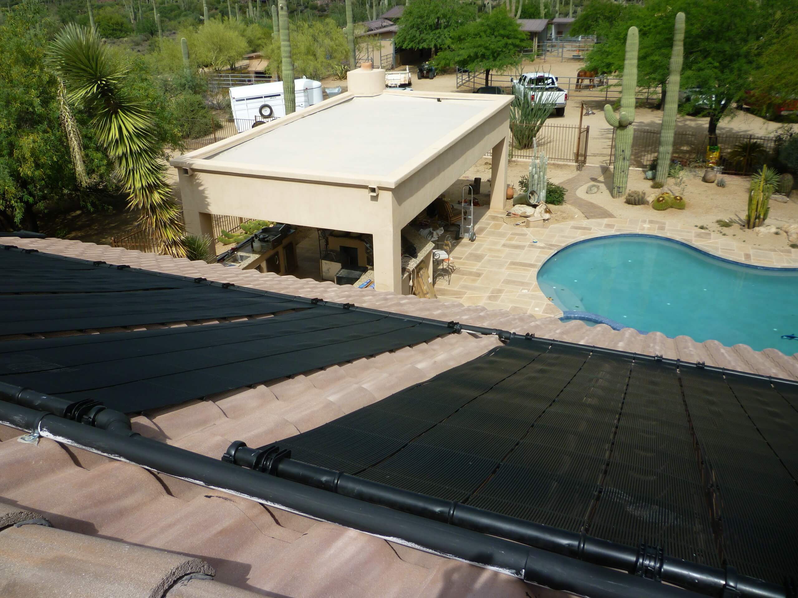 Sunsplash solar pool heating panel on roof